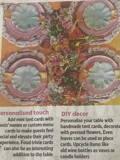 A close-up from the Times of India feature, highlighting the importance of a personalized touch and DIY decor, such as handmade tent cards and upcycled vases.