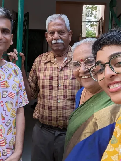 A selfie with our former landlords. These are the people who become your family in a new city, and I cherish these connections deeply.