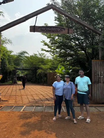 Our trekkers at the entrance of a resort, showing the comfortable stay options we provide.