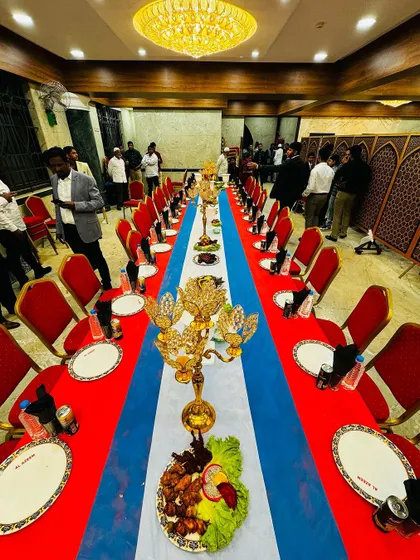A repeat of the overhead shot, emphasizing the grandeur and perfect symmetry of the Shahi Table setup.