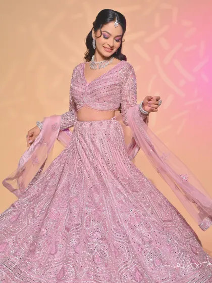 A classic pink lehenga look, beautifully executed by a student. The makeup is soft, radiant, and perfectly suited for a festive occasion.