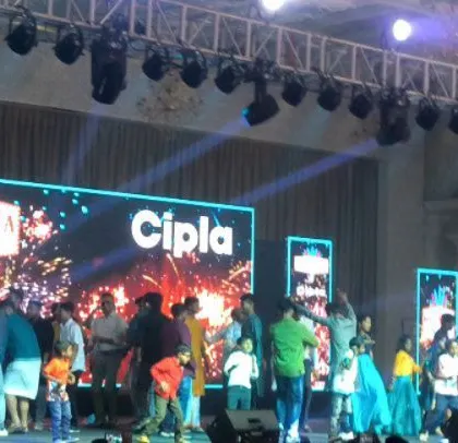 A family day for Cipla with a crowd of over 4,000. The large stage, complete with a massive LED screen and full lighting truss, shows my capability to handle large-scale corporate functions.