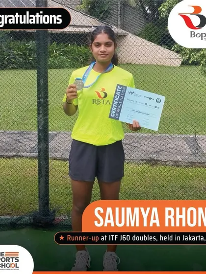 Another shot of Saumya Rhonde celebrating her runner-up trophy at the ITF J60 doubles event.