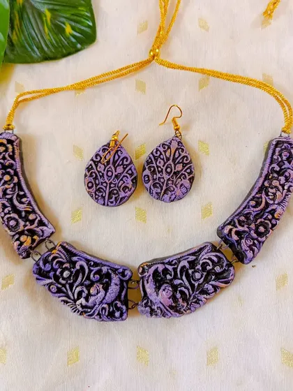 These are additional images and videos showing the wide assortment of necklace sets in various designs and colors that I have available for wholesale.