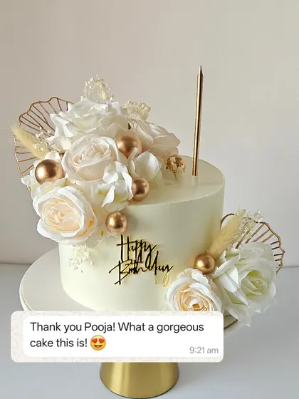 The client's reaction to the white and gold floral cake says it all. I love creating gorgeous cakes that taste as good as they look.