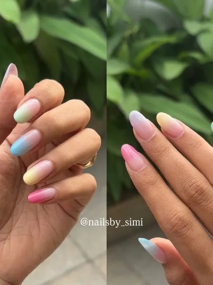 More angles of these beautiful pastel rainbow ombre nails. The seamless blend of colors on each nail creates such a soft and dreamy effect.