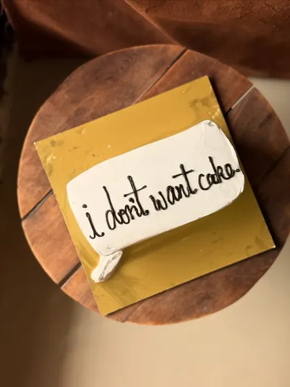 For the person who says they don't want a cake, this is the perfect gag gift. A cake shaped like a speech bubble that literally says "i dont want cake."