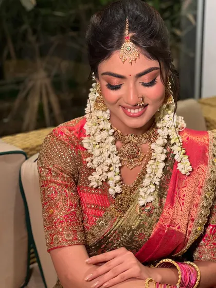 Stunningly beautiful. This bride is adorned with fresh jasmine garlands (gajra), a classic element of the South Indian bridal look.