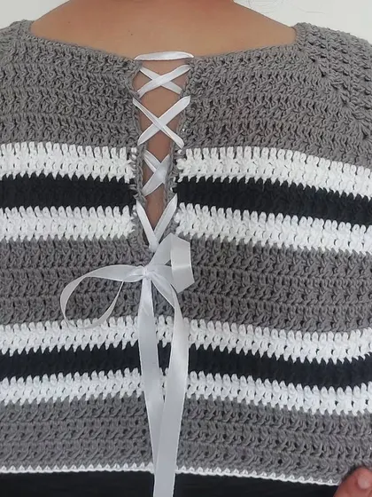 The back of the Diana Crop Top, showcasing the beautiful ribbon lacing that ensures a perfect, snug fit.