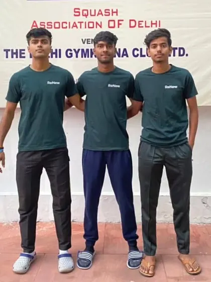 Three of our dedicated players at the Northern India Squash Championship, representing the strength of our team.