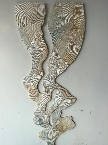 "Whispering Waves," a piece where flowing forms are carved in rhythm. This is where structure meets soul and stillness begins to move. It is made with texture paste on wood.