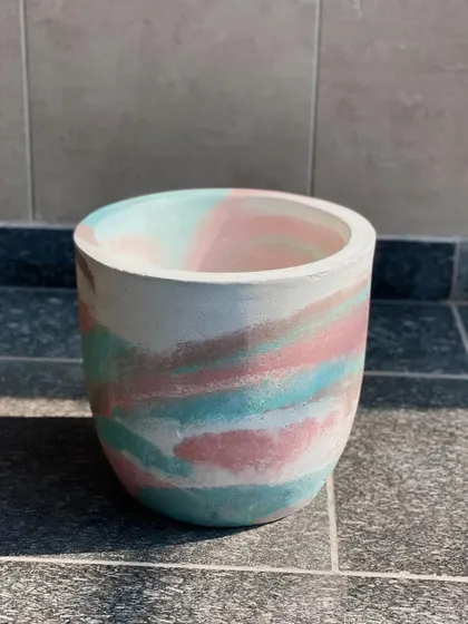 I love the blurred lines between art and design. This large handmade planter in dreamy pastels is inspired by the rainbow mountains of Peru, with color as the starting point of the work.