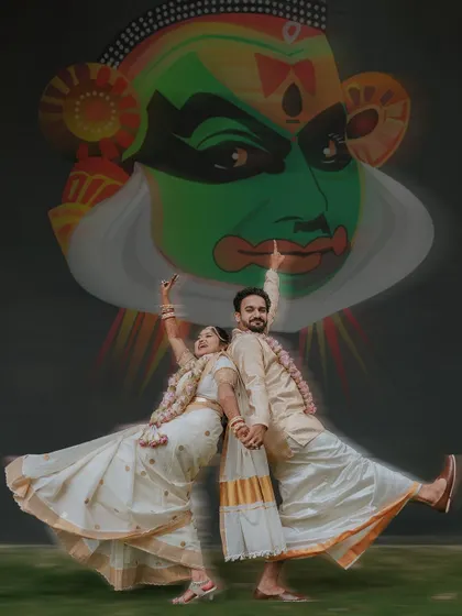 A creative and culturally rich portrait of a Kerala wedding couple. The Kathakali mural in the background adds a unique and artistic element that celebrates their heritage.
