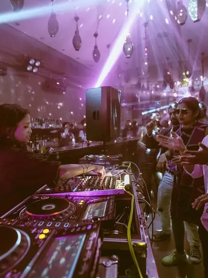 A wide shot from the DJ booth at i-Bar, capturing the full scene. You can see the crowd, the lighting, and me at the controls, bringing it all together for a memorable night.