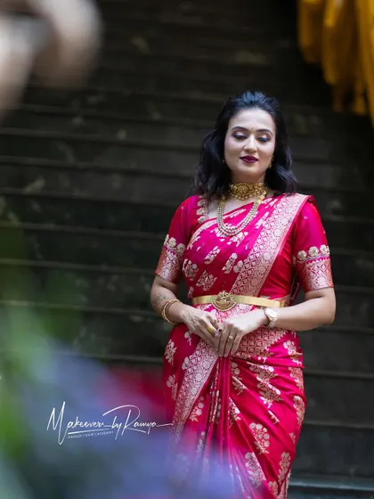 Another shot of Vaishnavi, capturing the elegance of her pose and the beautiful drape of her saree. The choker necklace adds a modern touch.