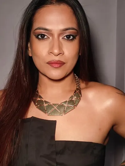 This is a look I created for myself that shows my personal love for glam. A sharp, winged eyeliner and a bold eyeshadow look is my go-to for a night out, and it’s a style I love creating for my clients too.