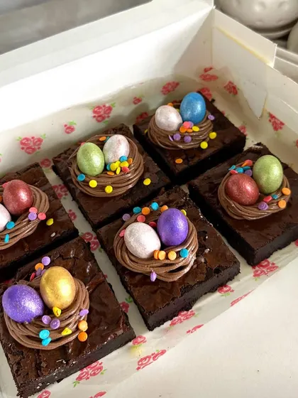 Another box of my popular egg nest brownies, ready for gifting. The shimmering chocolate eggs nestled in the chocolate frosting make them look as good as they taste.
