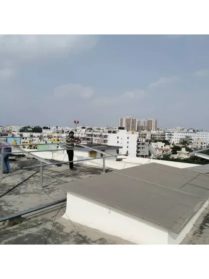 Our team at work setting up the mounting structures for a community solar project. We handle every aspect of the installation, ensuring a robust and durable framework for the solar panels.