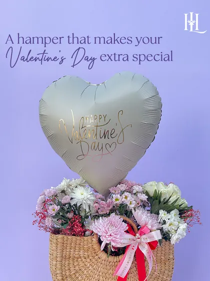 A clean and beautiful shot of the Valentine's jute bag hamper, showing how simple, natural materials can create an elegant and heartfelt gift.
