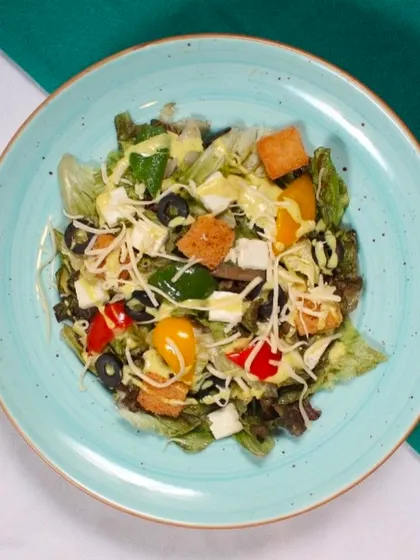 Delight in my mouthwatering Caesar Salad, featuring crisp greens, crunchy croutons, tangy dressing, and a sprinkle of cheese. A perfect balance of flavours.