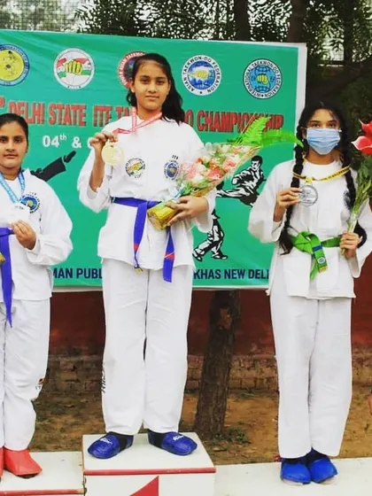 The results of our hard work are clear. My students are on the winners' podium at the 32nd Delhi State ITF Taekwon-do Championship, holding the medals they earned through discipline and practice.