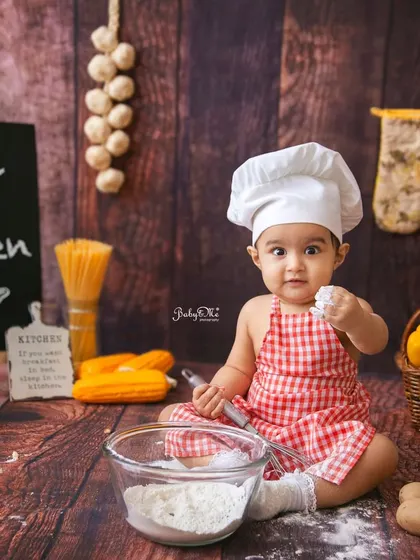Getting her hands messy with the flour is all part of the fun. These interactive sessions result in the most genuine smiles and expressions.