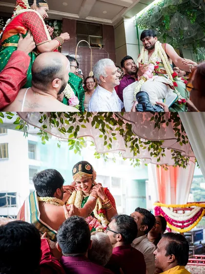 The bride is lifted high by her family during the garland exchange, a joyful and competitive ritual that we love to photograph.