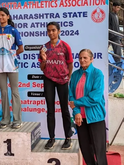Celebrating a 3rd place finish in the 80m hurdles at the Maharashtra Junior State Championship.