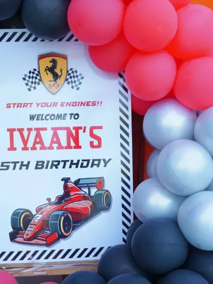 "Start your engines!" A Ferrari-themed welcome sign for Ivaan's 5th birthday. The iconic logo and race car graphic are perfect for a little Formula 1 fan.