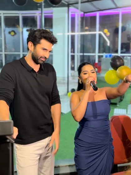 Guiding the proceedings with Aditya Roy Kapur at a grand opening. I ensure the event stays on track while allowing for spontaneous, fun interactions.
