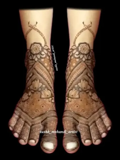 A delicate and graceful foot design with floral and vine patterns climbing up the ankle. This style is both modern and elegant.