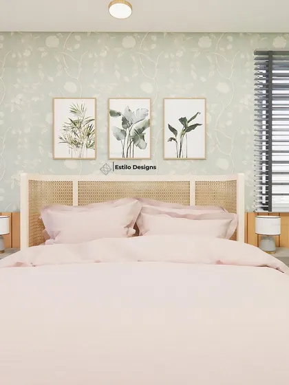 For a client who loves her garden, I brought the outdoors in with this English cottage inspired master bedroom. The design features a floral wallpaper, a distressed cane headboard, and a soft color palette to create a space that reflects her personality.