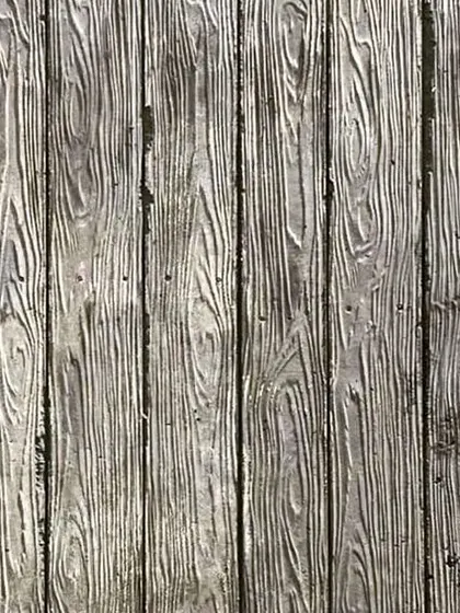 A duplicate image of the beautifully textured concrete wall, a testament to material exploration.