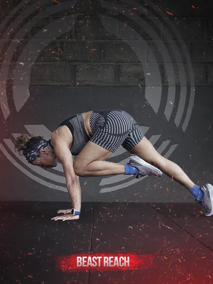 The Beast Reach is a stretch that targets the lats, shoulders, and spine, while also challenging core stability.