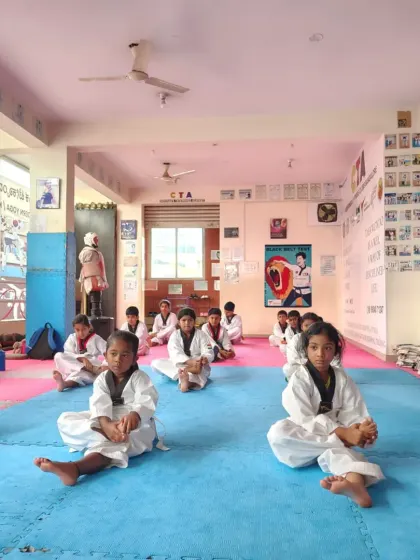 Students doing the butterfly stretch.