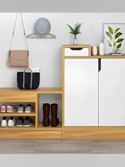 A minimalist shoe storage solution with a bench, perfect for keeping the entryway tidy and organized.