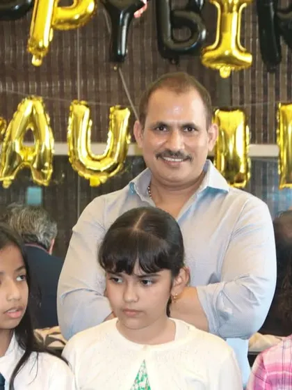 The birthday host surrounded by young guests. I capture the community feel of your celebration by including friends and family in the shots.