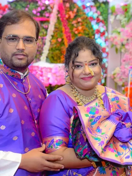 The new parents with their baby at the naming ceremony, or 'barsa'. A beautiful family portrait marking a very special day.