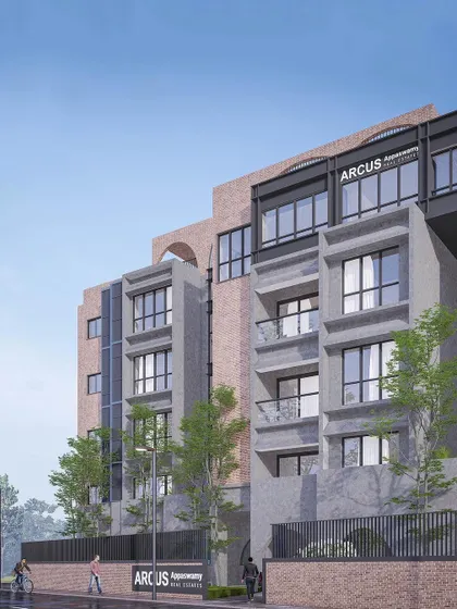 Renderings of the ARCUS project, visualizing the final design with its distinctive brick and grey facade, arched openings, and cantilevered sections.