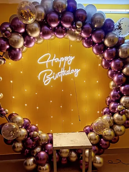 Another view of the purple and gold chrome balloon ring, showing the full circle.