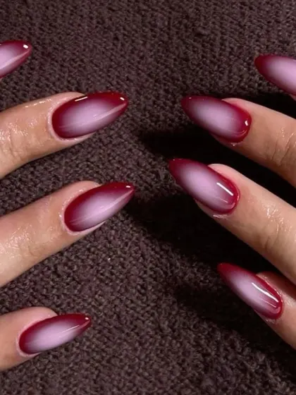 Obsessed with the aura nail trend. This set shows a deep red aura effect, blending from a dark border to a bright center. It's a super trendy and mesmerizing look that we can create in any color you love.