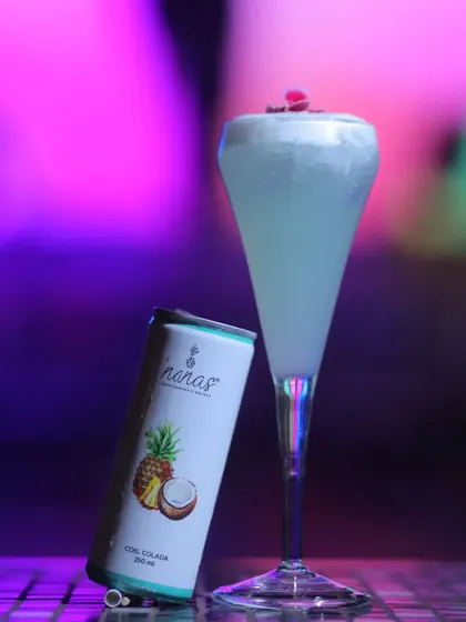 A cool blue piña colada inspired drink we created for a new menu launch. It's a refreshing, tropical escape in a glass.