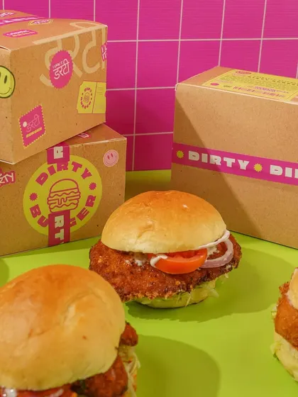 The final result of our creative burger shoot. The combination of fun styling, bold colors, and well-designed packaging comes together to create a strong and cohesive brand look.