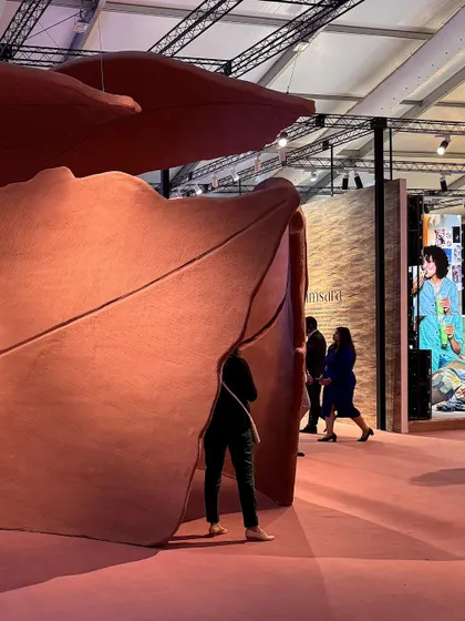 A repeat of image 9, showing a visitor within the 'Terra' installation.