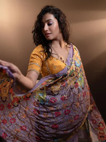 A shot that captures the flow and drape of the fabric, adding a sense of grace and movement.
