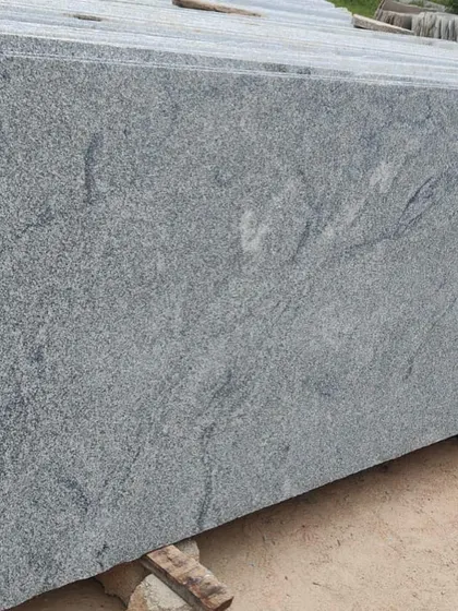 This Sadahalli granite slab has some light veining, adding unique character to the stone.