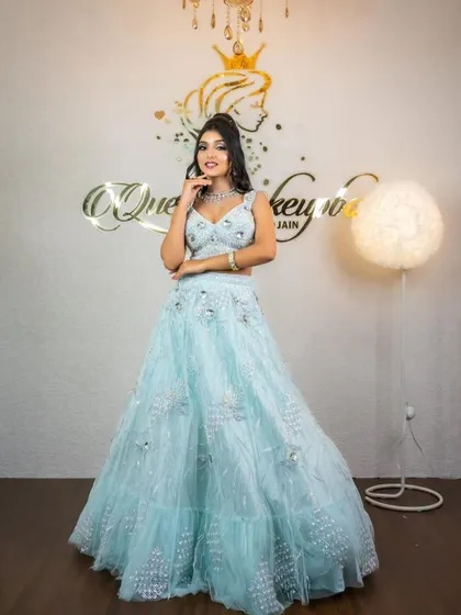 Another pose in the sky-blue lehenga, showing its beautiful flare.