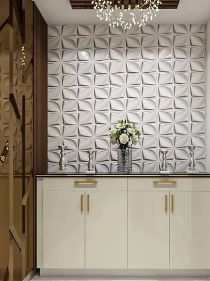 This entryway features a 3D tiled accent wall, which adds depth and texture. The simple cabinet provides storage, while the chandelier adds a touch of elegance.
