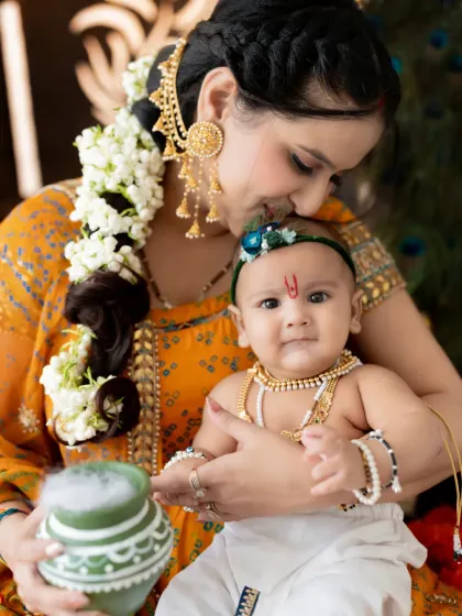 A close-up of a mother's kiss for her baby Krishna. These are the "sukoon" moments we love to capture, full of peace and emotion.