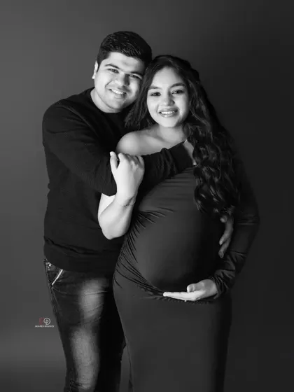 This classic black and white couple's portrait is full of warmth and happiness. It’s a timeless way to remember this special time together.